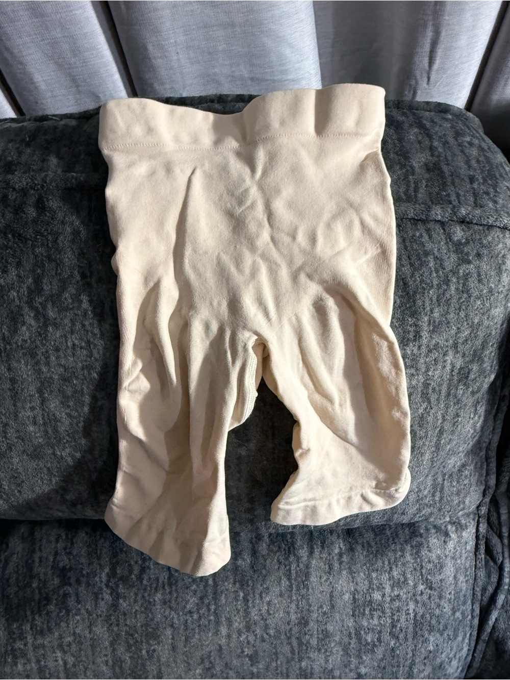 SKIMS Seamless Sculpt Mid Thigh Shapewear in a light sand XS